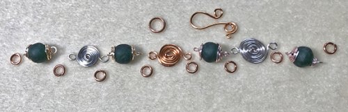 Nancy Chase's Spiral Times Bracelet - , Contemporary Wire Jewelry, Spirals, Wire Spiral, Spiral Wire Wrap, lay out the bracelet to assemble